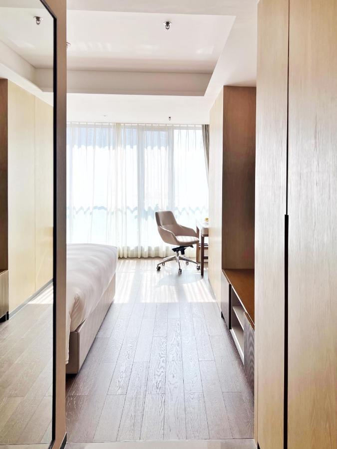 Marriott Executive Apartments Чунцин Экстерьер фото